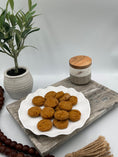 Load image into Gallery viewer, Plate of cookies wax melts on a wooden tray with a plant and jar in the background